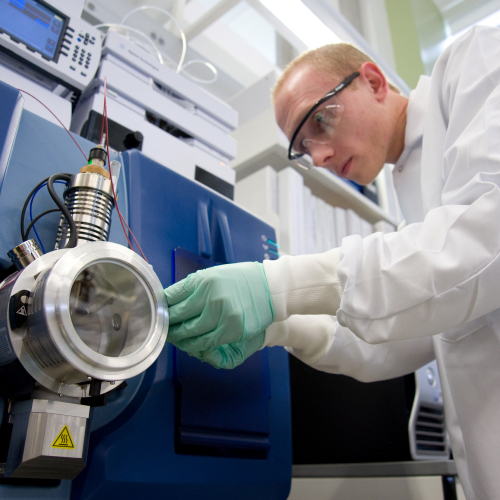 Person using lab equipment