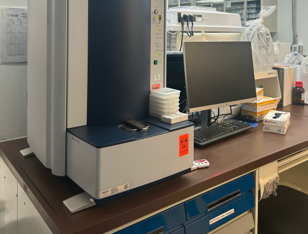 Lab equipment and a computer on a desk