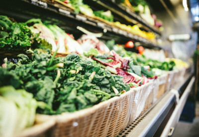 Vegetables in a grocery store produce section