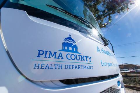 Close-Up of a white truck with the Pima County Health Department logo